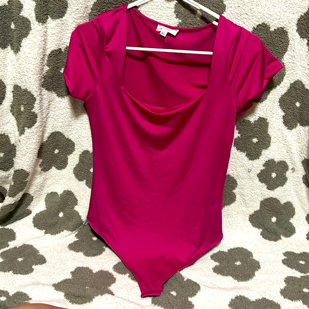 pink body suit